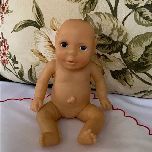 baby doll with umbilical cord